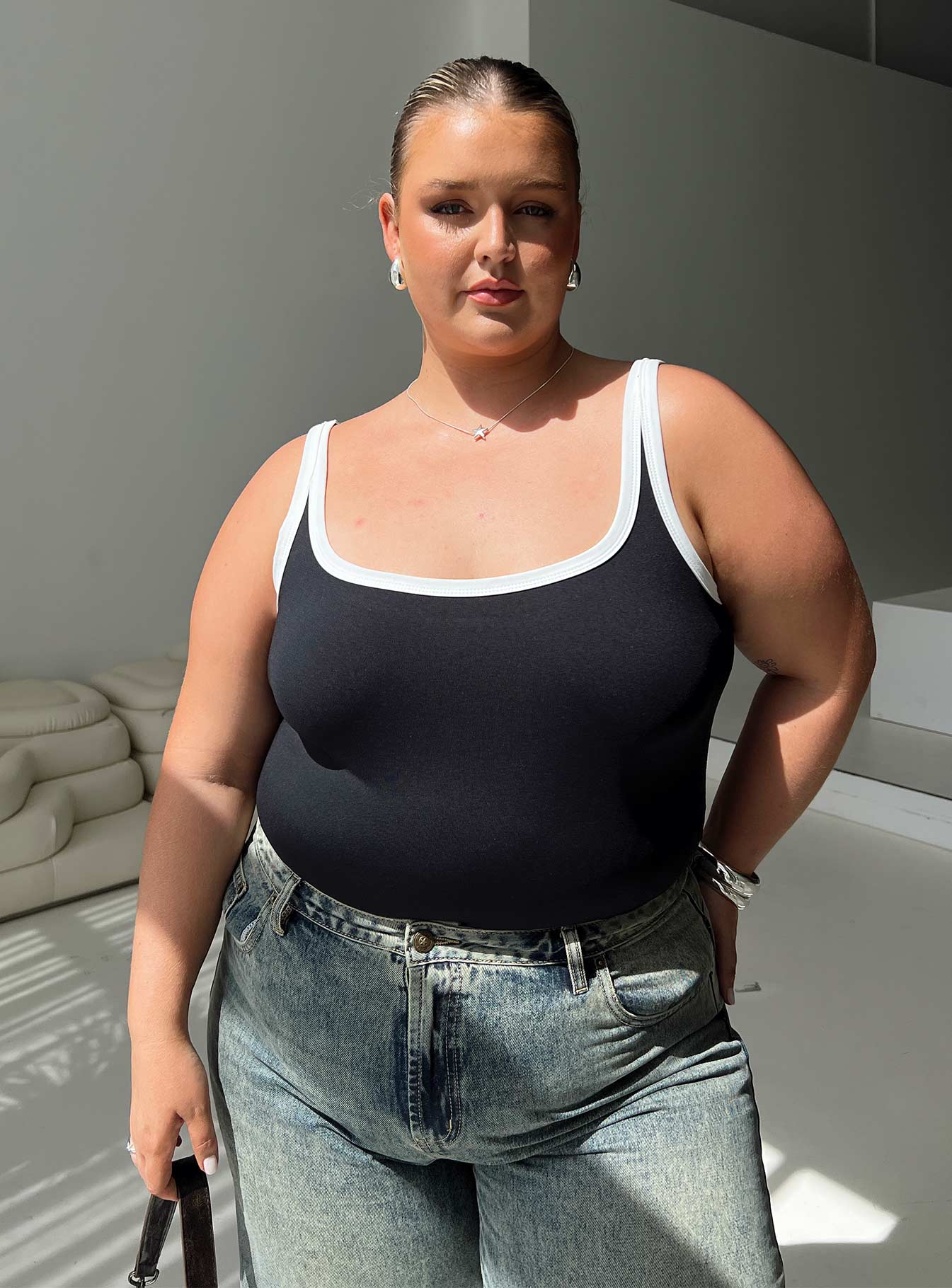 Astrea Bodysuit Black  White Curve